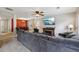 Spacious living room area with fireplace and open floor plan to dining room at 6904 Estepona St, Atlanta, GA 30349