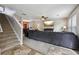 Open concept living space with stairs leading to upper floor at 6904 Estepona St, Atlanta, GA 30349