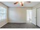 Bedroom with neutral carpeting, paint, and ensuite bathroom at 2910 Diana Sw Dr, Atlanta, GA 30315