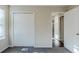 Bedroom with neutral carpeting and access to closet at 2910 Diana Sw Dr, Atlanta, GA 30315