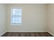 Bedroom with neutral carpeting and paint and a window at 2910 Diana Sw Dr, Atlanta, GA 30315
