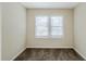 Cozy bedroom with a neutral carpet and natural lighting from the windows at 2910 Diana Sw Dr, Atlanta, GA 30315