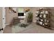 Stylish home office with modern desk, shelving, decor, and a comfortable ergonomic chair at 113 Fowler Dr, Bowdon, GA 30108