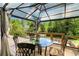 Outdoor patio with gazebo, clear table, and chairs with outdoor view is perfect for relaxing at 135 Longview Rd, Fayetteville, GA 30214