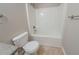 Cozy bathroom with a toilet, shower and tub combination, and vanity at 1401 Kala Dr, Lithonia, GA 30058