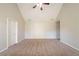 Cozy bedroom with neutral tones and a ceiling fan at 1401 Kala Dr, Lithonia, GA 30058