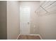 Walk-in closet with neutral walls and carpet, a single door and one wire rack for storage at 1401 Kala Dr, Lithonia, GA 30058