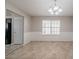 A charming dining area with tile floors and a chandelier at 1401 Kala Dr, Lithonia, GA 30058