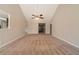 Open-concept living room featuring a ceiling fan and neutral tones at 1401 Kala Dr, Lithonia, GA 30058