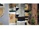 An aerial view shows a home featuring a patio, expansive backyard, and ample greenery at 3723 Verde Glen Ln, Cumming, GA 30040