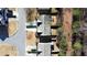 An aerial view displays a home with a spacious backyard, a patio, and lush trees at 3723 Verde Glen Ln, Cumming, GA 30040