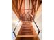 View looking up the wooden folding staircase into the attic at 3723 Verde Glen Ln, Cumming, GA 30040