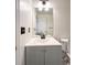 Bathroom featuring a vanity, light fixture, and toilet at 3723 Verde Glen Ln, Cumming, GA 30040