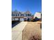Inviting townhouse with a two-car garage and a well-maintained front yard at 3723 Verde Glen Ln, Cumming, GA 30040