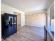 The kitchen features a stainless steel refrigerator and access to the other rooms at 3723 Verde Glen Ln, Cumming, GA 30040