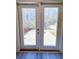 French doors offer backyard access and natural light from the patio and greenery at 3723 Verde Glen Ln, Cumming, GA 30040