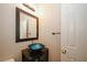 Charming bathroom features a decorative blue glass vessel sink and modern fixtures at 4486 Thorngate Ln, Acworth, GA 30101
