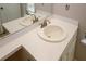 Bathroom features a sink with a white countertop and a large mirror at 4486 Thorngate Ln, Acworth, GA 30101