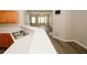 Kitchen offers stainless sink and open view to a sunlit living area at 4486 Thorngate Ln, Acworth, GA 30101