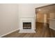 Living room features fireplace and view to the kitchen at 4486 Thorngate Ln, Acworth, GA 30101