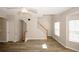 Bright living room with wood flooring and staircase at 4486 Thorngate Ln, Acworth, GA 30101