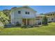 View of the back of the home with a patio and fenced-in yard at 6125 Dunbritan Ln, Atlanta, GA 30349