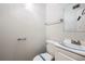 Simple half bathroom features a single sink, toilet, and chrome fixtures at 6125 Dunbritan Ln, Atlanta, GA 30349