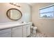 Bathroom vanity and toilet with tiled flooring at 6125 Dunbritan Ln, Atlanta, GA 30349