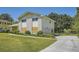 Corner lot home with a large driveway and mature trees at 6125 Dunbritan Ln, Atlanta, GA 30349
