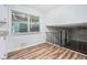 Bright kitchen boasts granite counters and wood-look floors open to the living space at 6125 Dunbritan Ln, Atlanta, GA 30349