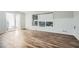 Spacious living room with durable laminate flooring at 6125 Dunbritan Ln, Atlanta, GA 30349