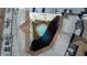 Aerial view showcasing rooftop features, a communal pool, and well-maintained architecture at 901 Abernathy Ne Rd # 5050, Atlanta, GA 30328