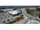 An aerial shot of a commercial building with a large parking lot and a view of the city at 901 Abernathy Ne Rd # 5050, Atlanta, GA 30328