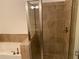 Clean bathroom boasting a separate soaking tub and tiled shower at 901 Abernathy Ne Rd # 5050, Atlanta, GA 30328