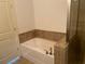 Clean bathroom boasting a separate soaking tub and tiled shower at 901 Abernathy Ne Rd # 5050, Atlanta, GA 30328