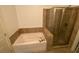 Elegant bathroom featuring a soaking tub and a glass-enclosed shower at 901 Abernathy Ne Rd # 5050, Atlanta, GA 30328