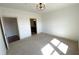 Neutral bedroom with two doorways and carpeted floor at 901 Abernathy Ne Rd # 5050, Atlanta, GA 30328