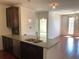 Contemporary kitchen featuring granite counters, stainless steel dishwasher, and pendant lighting at 901 Abernathy Ne Rd # 5050, Atlanta, GA 30328