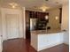 Modern kitchen features granite countertops, stainless steel appliances, and stylish pendant lights at 901 Abernathy Ne Rd # 5050, Atlanta, GA 30328