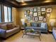 Elegant living room with neutral tones, curated artwork and comfortable seating at 901 Abernathy Ne Rd # 5050, Atlanta, GA 30328