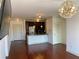 Modern open concept living space and kitchen area with hardwood floors at 901 Abernathy Ne Rd # 5050, Atlanta, GA 30328