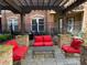 Outdoor patio offers comfortable seating around a table, providing a perfect space for relaxation and social gatherings at 901 Abernathy Ne Rd # 5050, Atlanta, GA 30328