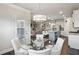 Open concept dining area adjacent to the kitchen and living room at 238 Dorothy Ln, Lawrenceville, GA 30046