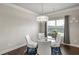 Bright dining area features a glass table and neutral decor at 238 Dorothy Ln, Lawrenceville, GA 30046