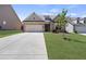 Charming single-Gathering home with a two-car garage and well-manicured lawn in a suburban neighborhood at 238 Dorothy Ln, Lawrenceville, GA 30046
