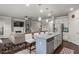 Open concept kitchen with island seating flows into the living room at 238 Dorothy Ln, Lawrenceville, GA 30046