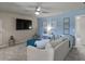 Cozy living room with a large screen TV and comfortable seating at 238 Dorothy Ln, Lawrenceville, GA 30046