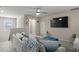 Relaxing living room featuring comfortable seating, large screen TV, and modern decor at 238 Dorothy Ln, Lawrenceville, GA 30046