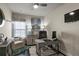 Inviting home office with a modern desk, comfortable chair, and stylish decor for a productive workspace at 238 Dorothy Ln, Lawrenceville, GA 30046