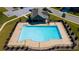 Birds-eye view of pool with community clubhouse, and surrounding green space at 238 Dorothy Ln, Lawrenceville, GA 30046